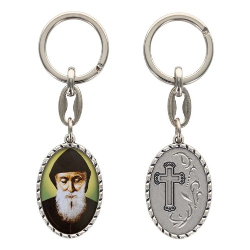 Porte-clés en aluminium de couleur argenté hauteur 3,8 cm, avec résine. Disponible avec plusieurs saints au choix.