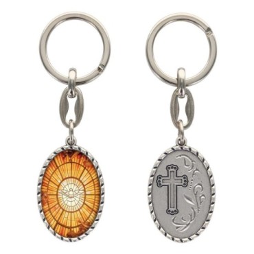 Porte-clés en aluminium de couleur argenté hauteur 3,8 cm, avec résine. Disponible avec plusieurs saints au choix.