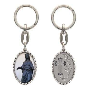 Porte-clés en aluminium de couleur argenté hauteur 3,8 cm, avec résine. Disponible avec plusieurs saints au choix.