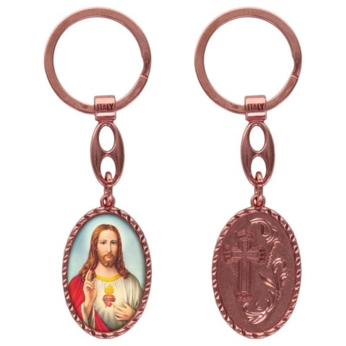 Porte-clés en aluminium de couleur cuivrée, hauteur 3,8 cm, avec résine. Disponible avec plusieurs saints au choix.