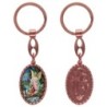 Porte-clés en aluminium de couleur cuivrée, hauteur 3,8 cm, avec résine. Disponible avec plusieurs saints au choix.