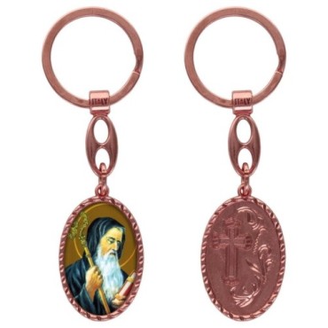 Porte-clés en aluminium de couleur cuivrée, hauteur 3,8 cm, avec résine. Disponible avec plusieurs saints au choix.