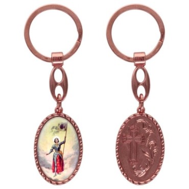 Porte-clés en aluminium de couleur cuivrée, hauteur 3,8 cm, avec résine. Disponible avec plusieurs saints au choix.