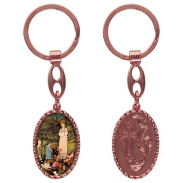Porte-clés en aluminium de couleur cuivrée, hauteur 3,8 cm, avec résine. Disponible avec plusieurs saints au choix.