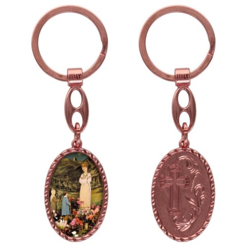 Porte-clés en aluminium de couleur cuivrée, hauteur 3,8 cm, avec résine. Disponible avec plusieurs saints au choix.