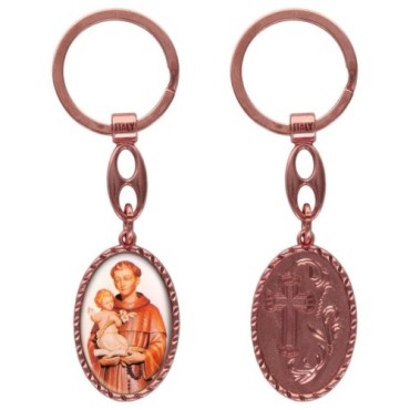 Porte-clés en aluminium de couleur cuivrée, hauteur 3,8 cm, avec résine. Disponible avec plusieurs saints au choix.