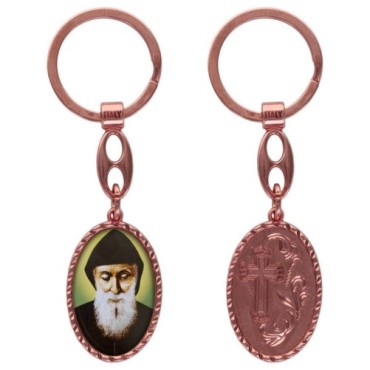 Porte-clés en aluminium de couleur cuivrée, hauteur 3,8 cm, avec résine. Disponible avec plusieurs saints au choix.