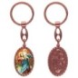Porte-clés en aluminium de couleur cuivrée, hauteur 3,8 cm, avec résine. Disponible avec plusieurs saints au choix.