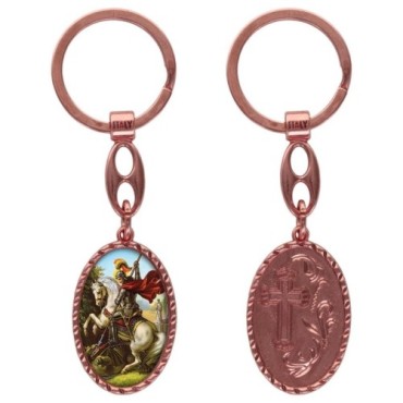 Porte-clés en aluminium de couleur cuivrée, hauteur 3,8 cm, avec résine. Disponible avec plusieurs saints au choix.