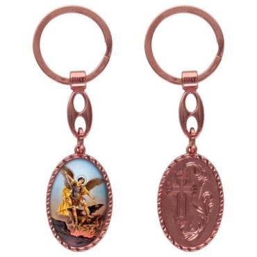 Porte-clés en aluminium de couleur cuivrée, hauteur 3,8 cm, avec résine. Disponible avec plusieurs saints au choix.