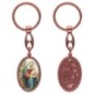 Porte-clés en aluminium de couleur cuivrée, hauteur 3,8 cm, avec résine. Disponible avec plusieurs saints au choix.