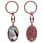 Porte-clés en aluminium de couleur cuivrée, hauteur 3,8 cm, avec résine. Disponible avec plusieurs saints au choix.