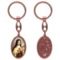 Porte-clés en aluminium de couleur cuivrée, hauteur 3,8 cm, avec résine. Disponible avec plusieurs saints au choix.