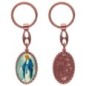 Porte-clés en aluminium de couleur cuivrée, hauteur 3,8 cm, avec résine. Disponible avec plusieurs saints au choix.