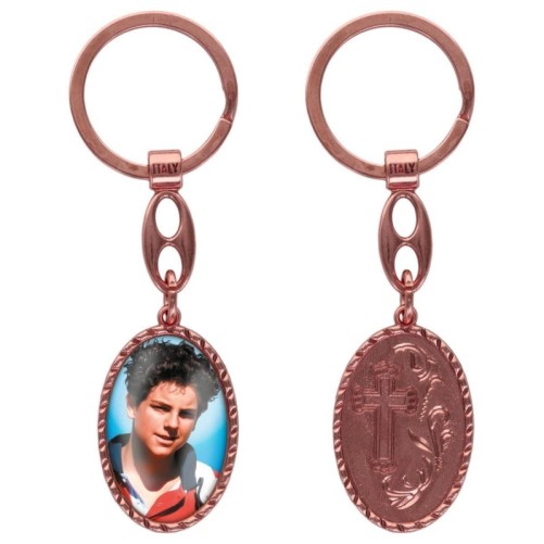 Porte-clés en aluminium de couleur cuivrée, hauteur 3,8 cm, avec résine. Disponible avec plusieurs saints au choix.