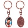 Porte-clés en aluminium de couleur cuivrée, hauteur 3,8 cm, avec résine. Disponible avec plusieurs saints au choix.