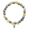 Bracelet sur elastique en hematite et pierre naturelle ou synthetique Ø 7 mm avec croix..