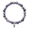 Bracelet sur elastique en hematite et pierre naturelle ou synthetique Ø 7 mm avec croix..