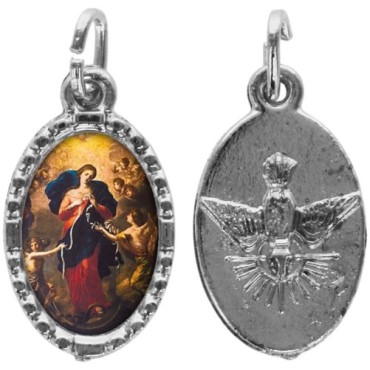 Médaille métal de couleur argentée ovale avec rebord effet dentelle H.1,5 cm avec résine. Disponible avec différents Saints.