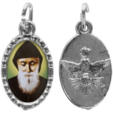 Médaille métal de couleur argentée ovale avec rebord effet dentelle H.1,5 cm avec résine. Disponible avec différents Saints.