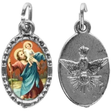 Médaille métal de couleur argentée ovale avec rebord effet dentelle H.1,5 cm avec résine. Disponible avec différents Saints.