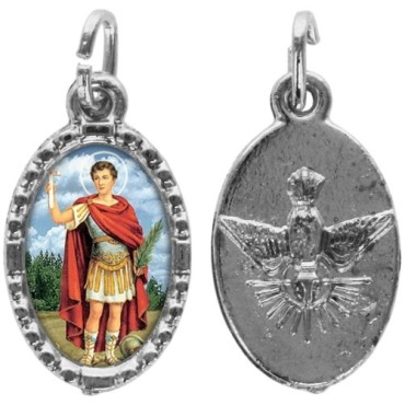Médaille métal de couleur argentée ovale avec rebord effet dentelle H.1,5 cm avec résine. Disponible avec différents Saints.