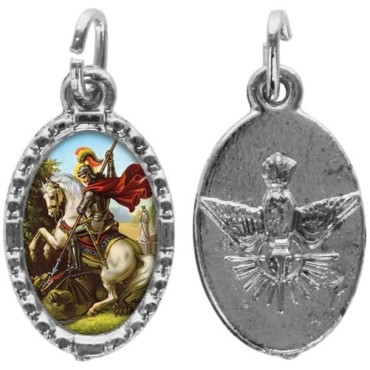 Médaille métal de couleur argentée ovale avec rebord effet dentelle H.1,5 cm avec résine. Disponible avec différents Saints.