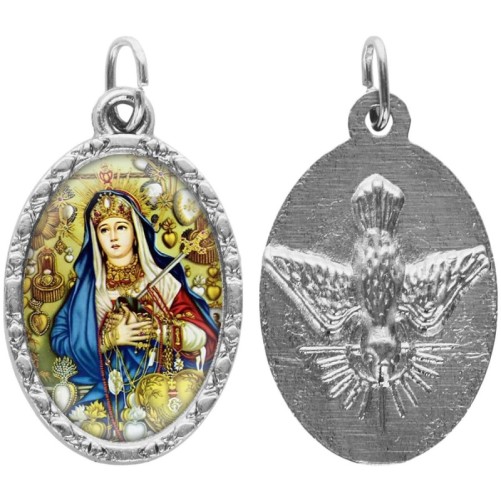 Médaille métal de couleur argentée ovale avec rebord effet dentelle H.2,5 cm avec résine. Disponible avec différents Saints.