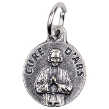Médaille moulée en métal couleur argentée Ø 1.2 cm. Plusieurs Saints.