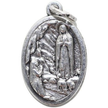 Médaille en métal couleur argentée forme ovale H. 2,2 cm. Plusieurs saints.