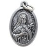 Médaille en métal couleur argentée forme ovale H. 2,2 cm. Plusieurs saints.