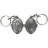 Porte-clés H. 4.5 cm en métal couleur argentée forme ovale double face, plusieurs saints..