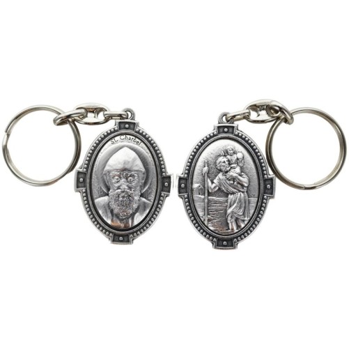 Porte-clés ovale en métal argenté, H. 4,5 cm, style croix, double face.