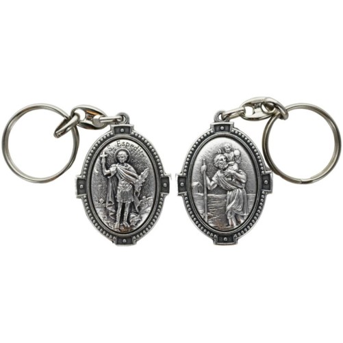 Porte-clés ovale en métal argenté, H. 4,5 cm, style croix, double face.