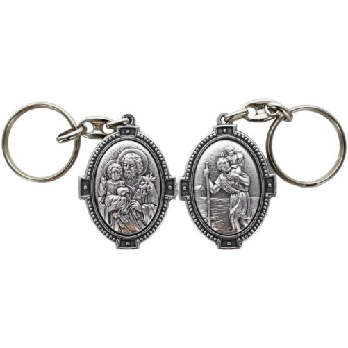 Porte-clés ovale en métal argenté, H. 4,5 cm, style croix, double face.