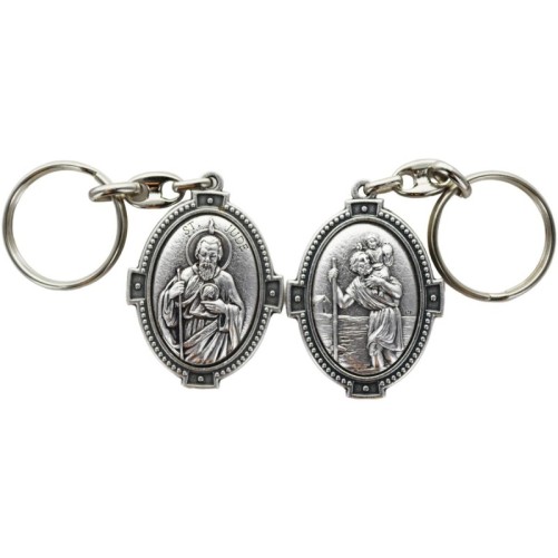 Porte-clés ovale en métal argenté, H. 4,5 cm, style croix, double face.
