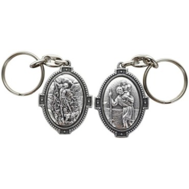 Porte-clés H. 4.5 cm en métal couleur argentée forme ovale double face, plusieurs saints..