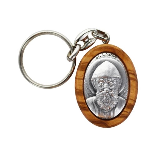 Porte-clés H. 4 cm en bois d’olivier avec plaque en métal argenté.