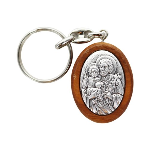 Porte-clés H. 4 cm en bois d’olivier avec plaque en métal argenté.