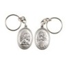 Porte-clés H. 3,7 cm en métal couleur argentée forme ovale double face, plusieurs saints..