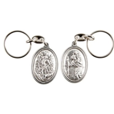 Porte-clés H. 3,7 cm en métal couleur argentée forme ovale double face, plusieurs saints..