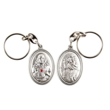 Porte-clés H. 3,7 cm en métal couleur argentée forme ovale double face, plusieurs saints..