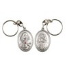 Porte-clés H. 3,7 cm en métal couleur argentée forme ovale double face, plusieurs saints..