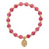 Bracelet sur élastique grains rond en verre Ø 6 mm avec médaille de la V. Miraculeuse de couleur dorée. Différentes couleurs