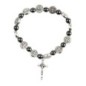 Bracelet sur élastique avec médailles de saint Benoit et grains hématite Ø 9 mm, avec croix de saint Benoit.