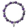 Bracelet sur elastique en hematite et pierre naturelle ou synthetique Ø 7 mm avec croix..