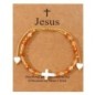 Bracelet sur corde réglable grains de forme cylindrique avec croix et coeur en coquille naturelle.
