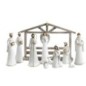 Crèche en résine de 11 personnages avec cabane H. 19.5 - 26 cm - L. 36 cm.