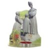 Bougeoir en plexi assemblable, avec représentations de saints. Livre avec une bougie, H. 13,5 cm. Plusieurs saints