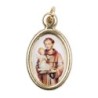 Médaille métal couleur dorée ovale H. 2,5 cm avec résine, plusieurs saints.